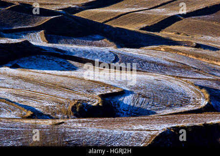 Zhangye, China. 11th Jan, 2017. (EDITORIAL USE ONLY. CHINA OUT) Stunning scenery of Yijiawan Village in Zhangye, northwest China's Gansu Province. The Yijiawan Village is located to the north of Qilian Mountains. Credit: ZUMA Press, Inc./Alamy Live News Stock Photo