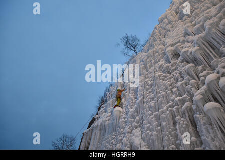 Liberec, Czech Republic. 12th Jan, 2017. A man climbs up an artificial ice wall in Liberec, Czech Republic, Thursday, January 12, 2017. Central Europe has been hit by unusually freezing weather in recent days. © Radek Petrasek/CTK Photo/Alamy Live News Stock Photo