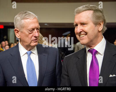 Washington DC, USA. 12th January 2017. US Marine Corps General James N. Mattis (retired), left and former US Secretary of Defense William Cohen, right, share a thought prior to the US Senate Committee on Armed Services confirmation hearing on Mattis' nomination to be US Secretary of Defense on Capitol Hill in Washington, DC on Thursday, January 12, 2017. Cohen, who also served in the US Senate as a Republican from Maine, introduced and endorsed Mattis. Credit: MediaPunch Inc/Alamy Live News Stock Photo