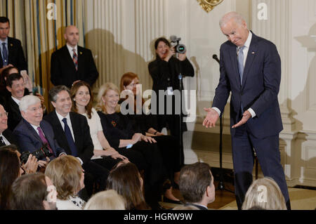 Washington DC, USA. 12th Jan, 2017. United States Vice President Joe Biden reacts as US President Barack Obama delivers remarks during an event in the State Dinning room of the White House  in Washington, DC. Credit: Olivier Douliery/Pool via CNP /MediaPunch Credit: MediaPunch Inc/Alamy Live News Stock Photo