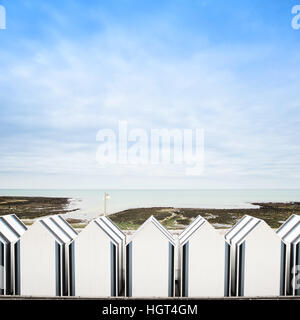Yport, between Etretat and Fecamp, Normandy. Beach huts or cabins in low tide ocean. France, Europe. Stock Photo