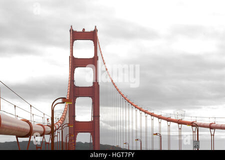 Zoom of heavy traffic on Golden Gate Bridge, connecting San Francisco to Marin County, warm air rising from road and cars in the front Stock Photo