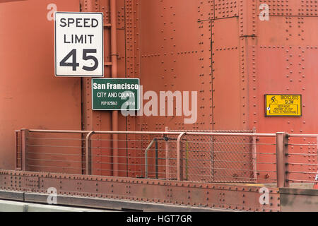 Speed limit and population indication signs on Golden gate Bridge in San Francisco Stock Photo