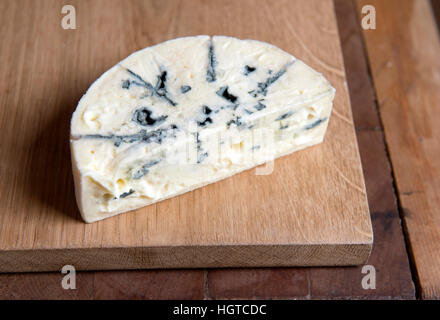 A wedge of soft Danish Blue cheese Stock Photo