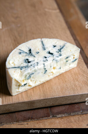 A wedge of soft Danish Blue cheese Stock Photo