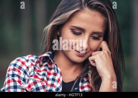 Young woman relaxing in nature Stock Photo