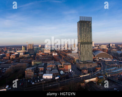 Manchester city skyline looking down Deansgate towards the Hilton hotel. Stock Photo