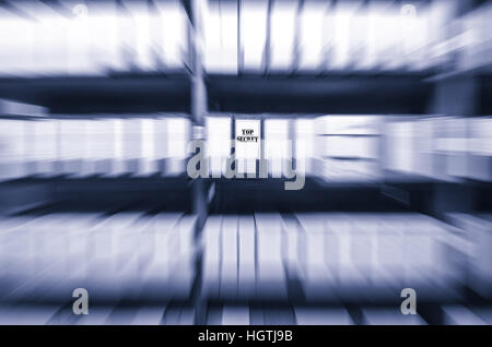 Old archive shelves full of top secret paper documents , old archive concept , top secret concept. Radial zoom filter effect focused on top secret arc Stock Photo
