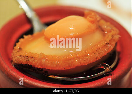 Cooked abalone soup, delicious luxury Chinese food Stock Photo