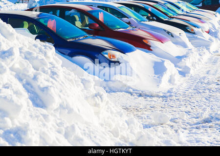 Cars buried in snow after a snowstorm. Stock Photo