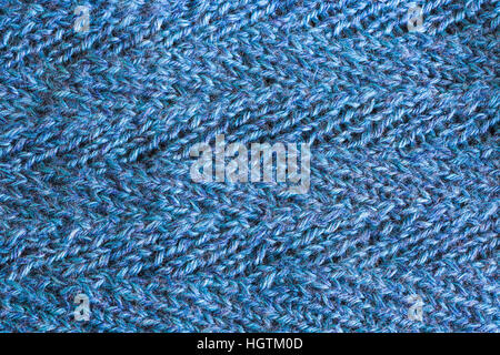 Herringbone pattern in a close up homemade knitted material. Stock Photo