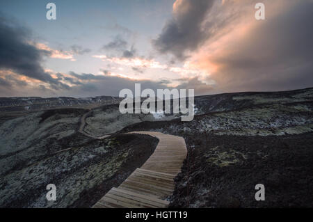 Winding wooden pathway at the Grábrók Crater, cinder cones in west Iceland. Stock Photo