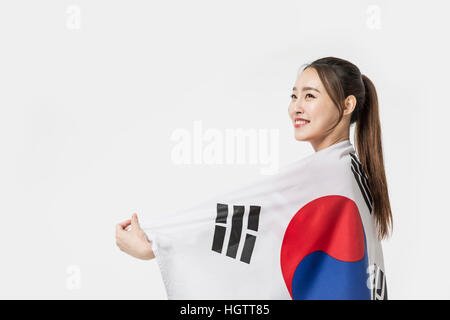 Side view portrait of young smiling Korean.cheerleader woman Stock Photo
