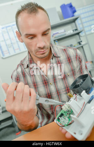 repairing a printed circuit board. Micro technology and repairs ...