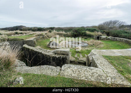 Old broken German bunkers of Atlantic Wall and artillery battery of Longues sur Mer. The battery at Longues was situated between the landing beaches O Stock Photo