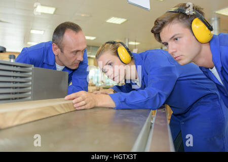 Female apprentice carpenter at work Stock Photo