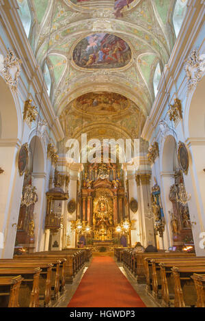 VIENNA, AUSTRIA - DECEMBER 19, 2016: The nave of baroque church Mariahilfer Kirche. Stock Photo