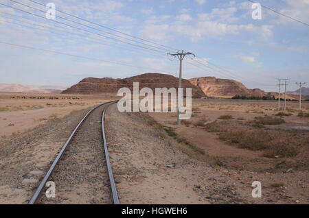 Unmanned Railway line on the highway to Wadi Rum, Jordan Stock Photo