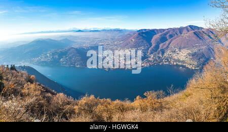 Panoramic view of Como lake in late autumn, Italy. View from Brunate town. Cernobbio city and Swiss Alps on the background Stock Photo