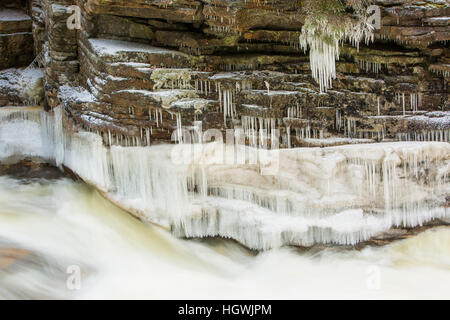 Icicles and Lower Falls on the Ammonoosuc River in Twin Mountain, New Hampshire. Stock Photo