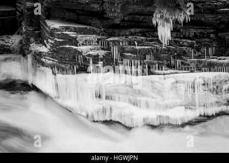 Icicles and Lower Falls on the Ammonoosuc River in Twin Mountain, New Hampshire. Stock Photo