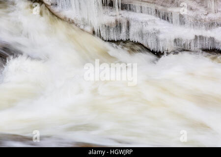 Icicles and Lower Falls on the Ammonoosuc River in Twin Mountain, New Hampshire. Stock Photo