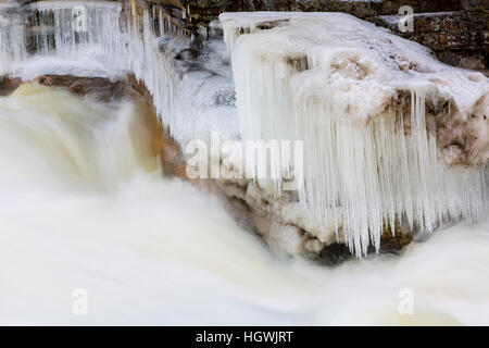 Icicles and Lower Falls on the Ammonoosuc River in Twin Mountain, New Hampshire. Stock Photo