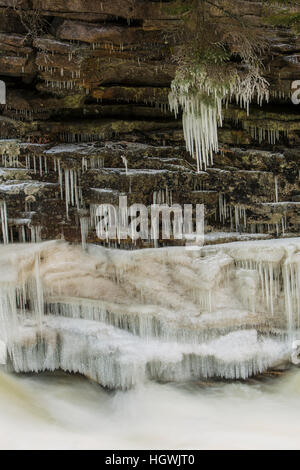 Icicles and Lower Falls on the Ammonoosuc River in Twin Mountain, New Hampshire. Stock Photo