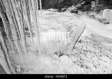 Icicles and Lower Falls on the Ammonoosuc River in Twin Mountain, New Hampshire. Stock Photo