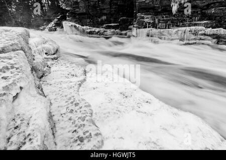 Icicles and Lower Falls on the Ammonoosuc River in Twin Mountain, New Hampshire. Stock Photo