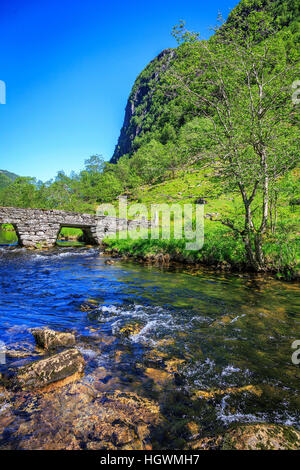 Part of  the old stone Honndola Bridge,  Sogn og Fjordane, Norway taken on a Spring morning. Stock Photo