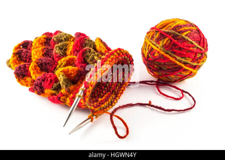 Crochet gloves with metal hooks and yarn ball on white background Stock Photo
