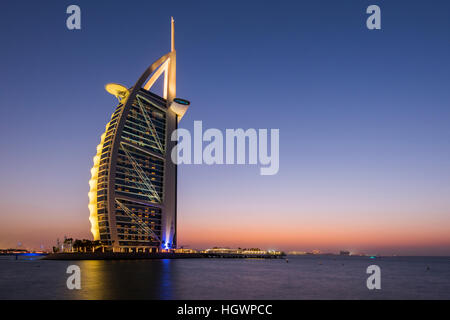 Burj Al Arab luxury hotel at twilight, Dubai, United Arab Emirates Stock Photo
