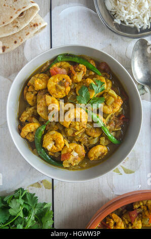 Goan prawn curry with rice and chapatis Stock Photo