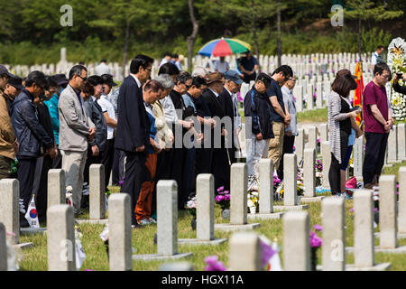 People commemorating dead veterans during Memorial day. Stock Photo