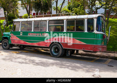 Colourful local bus stops on the street in the El Penol, Medellin, Colombia Stock Photo