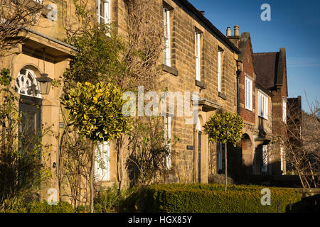 UK, England, Derbyshire, Ashford in the Water, Church Street, terrace of houses formerly of Chatsworth Estate Stock Photo
