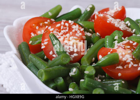 healthy salad of tomatoes, green beans and sesame. macro Stock Photo