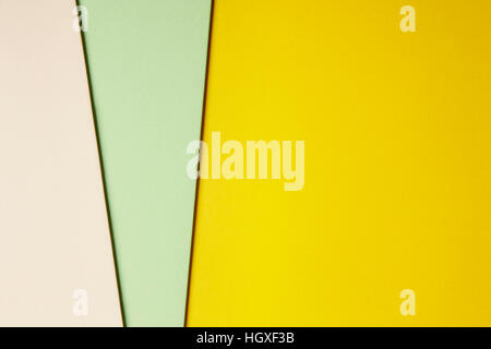 Colored cardboards background yellow green beige tone. Copy space. Horizontal Stock Photo