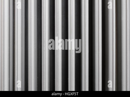 Background of an old cast iron radiator Stock Photo