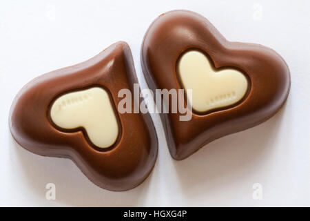 heart shaped chocolates from box of Lindt Hello nice to sweet you just wanna say thank you chocolates isolated on white background Stock Photo