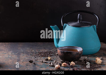 Variety of dry tea with teapot Stock Photo