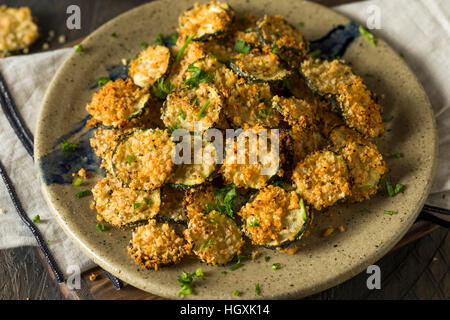 Homemade Breaded Baked Zucchini Chips with Dipping Sauce Stock Photo