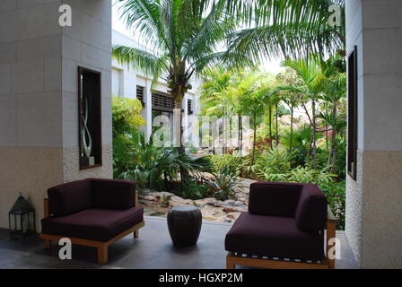 seating area in breeze way of Caribbean hotel Stock Photo