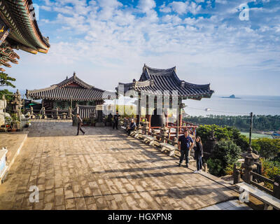 Jeju Island, KOREA - NOVEMBER 12: The tourist visited Sanbanggulsa temple that located on Sanbangsan Mountain. On the way to the cave, with the temple Stock Photo
