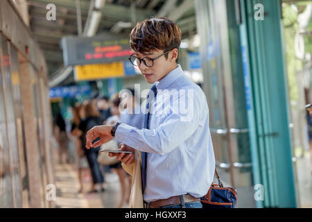Businessman checking time Stock Photo