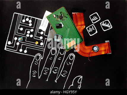 Computer circuit board and pieces laid on a drawing of an outline of a hand black background white outline Stock Photo