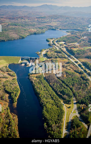 The Moore Dam and Moore Reservoir on the Connecticut River in Littleton, New Hampshire.  White Mountains are in the distance.  Interstate 93 parallels Stock Photo