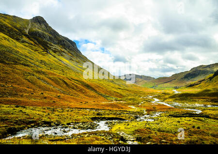 Pike o’Stickle overlooks Mickleden a valley at the head of Great Langdale in the Lake District Stock Photo