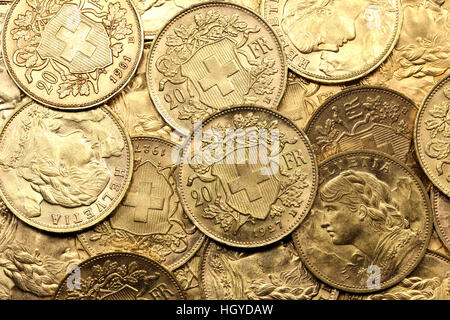 Swiss Vreneli gold coins for background use Stock Photo